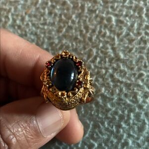 Elegant Gold and Black Gemstone Ring